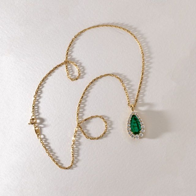 3.62 Carat Natural Pear Emerald Graduated Cluster Halo Pendant in Yellow Gold