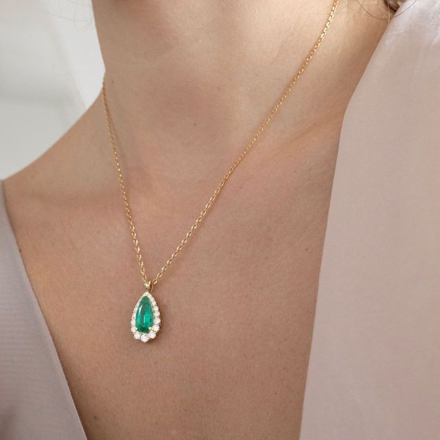 3.62 Carat Natural Pear Emerald Graduated Cluster Halo Pendant in Yellow Gold