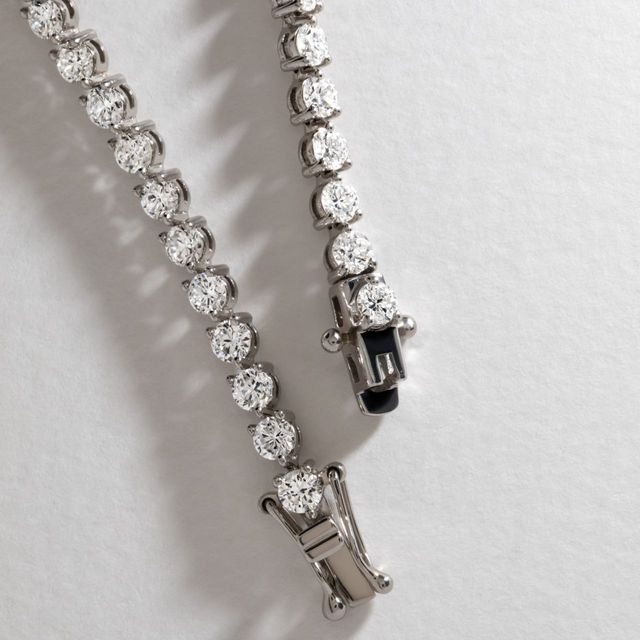 5.70 Carat Lab Grown Round Diamond Three Claw Tennis Bracelet in 9k White Gold