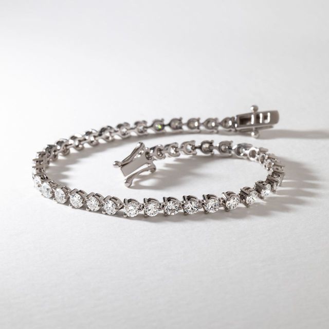 5.70 Carat Lab Grown Round Diamond Three Claw Tennis Bracelet in 9k White Gold