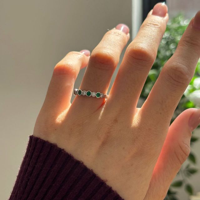 0.50 Carat Round Green Emerald And Diamond Bezel Set Eternity Band in White Gold