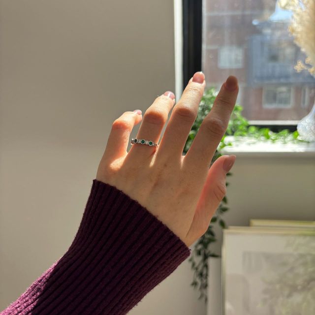 0.50 Carat Round Green Emerald And Diamond Bezel Set Eternity Band in White Gold