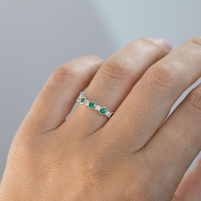 0.50 Carat Round Green Emerald And Diamond Bezel Set Eternity Band in White Gold