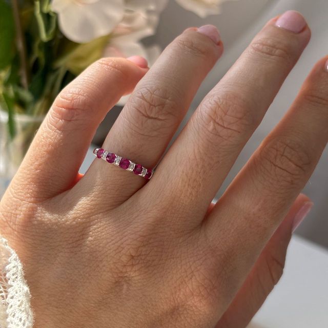 0.84 Carat Natural Round Ruby And 0.60 Carat Diamond Shared Claw Eternity Ring in Platinum