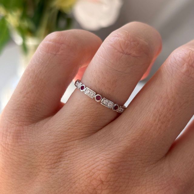 0.30 Carat Natural Round Ruby And Diamond Grain Set Eternity Band in White Gold