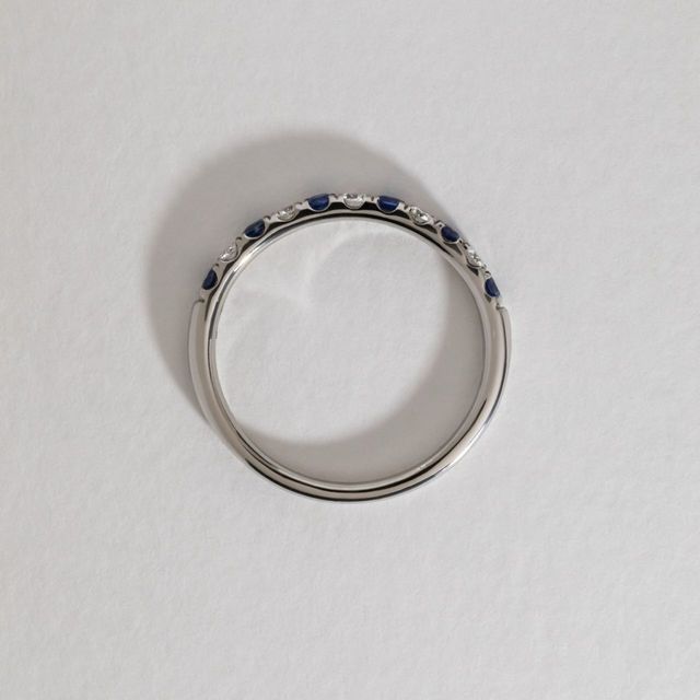 0.25 Carat Natural Round Blue Sapphire And Diamond Micro Set Half Eternity Ring in Platinum