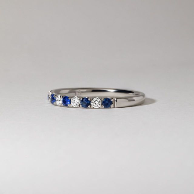 0.25 Carat Natural Round Blue Sapphire And Diamond Micro Set Half Eternity Ring in Platinum