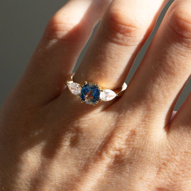 1.74 Carat Natural Cushion Teal Sapphire Trilogy Engagement Ring in Yellow Gold - Nimi