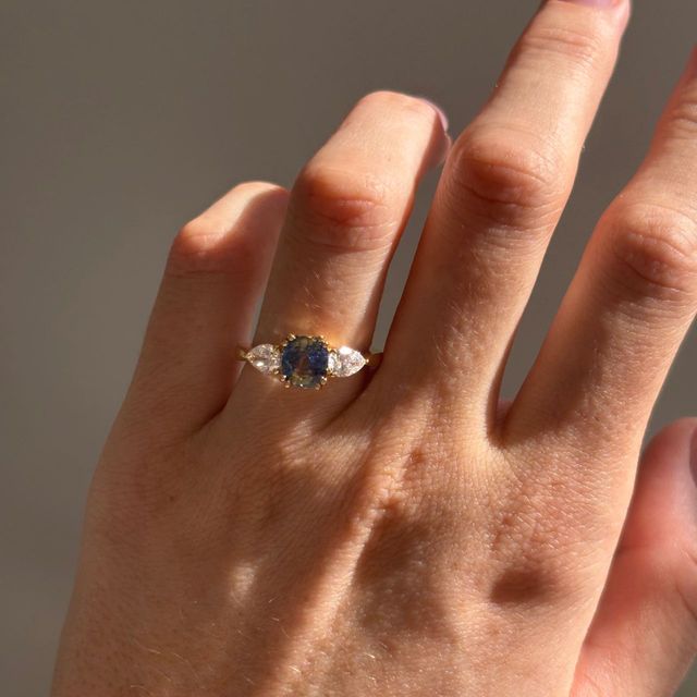 1.74 Carat Natural Cushion Teal Sapphire Trilogy Engagement Ring in Yellow Gold - Nimi