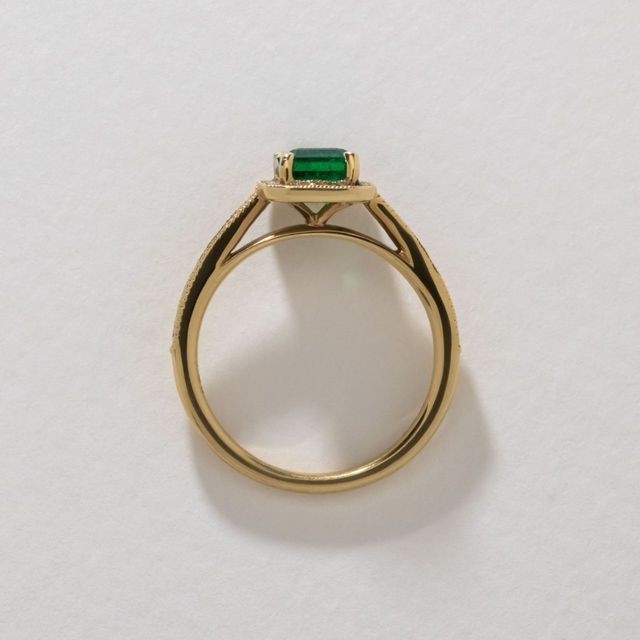 0.98 Carat Natural Emerald Cut Green Emerald Grain Set Halo Engagement Ring in Yellow Gold