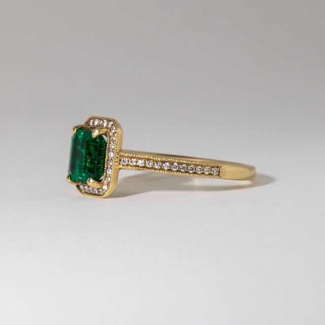 0.98 Carat Natural Emerald Cut Green Emerald Grain Set Halo Engagement Ring in Yellow Gold
