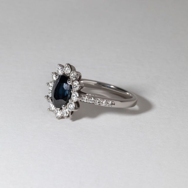 1.40 Carat Natural Oval Blue Sapphire and Diamond Cluster Engagement Ring in White Gold - Bespoke