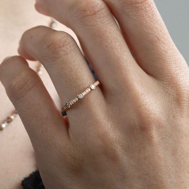 0.40 Carat Natural Round Diamond Grain and Rubover Set Eternity Ring in Rose Gold