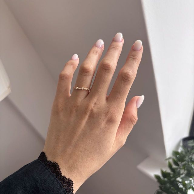 0.40 Carat Natural Round Diamond Grain and Rubover Set Eternity Ring in Rose Gold