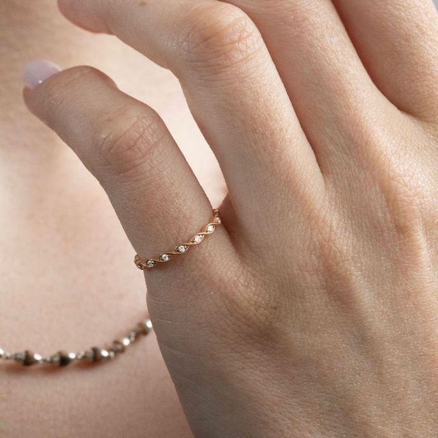 0.10 Carat Natural Round Diamond Grain Set Twisted Eternity Ring in Rose Gold