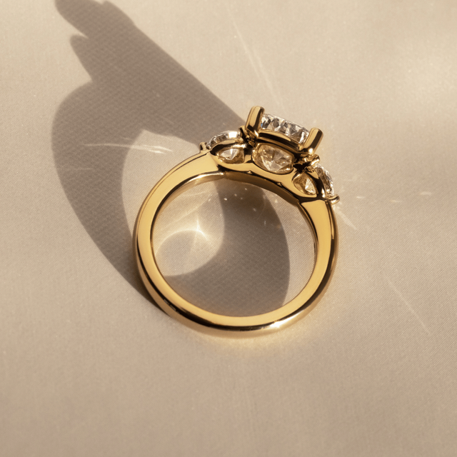 1.60 Carat Lab Grown Elongated Cushion Diamond Trilogy Engagement Ring in Yellow Gold - Trinity