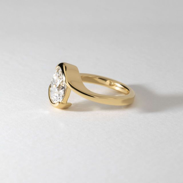 3 Carat Lab Grown Oval Diamond Bezel Sculptural Engagement Ring in Yellow Gold - Solenne
