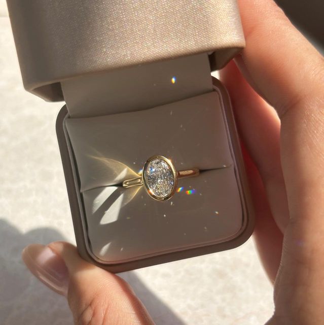 1.50 Carat Lab Grown Oval Diamond Bezel Engagement Ring in Yellow Gold - Georgia