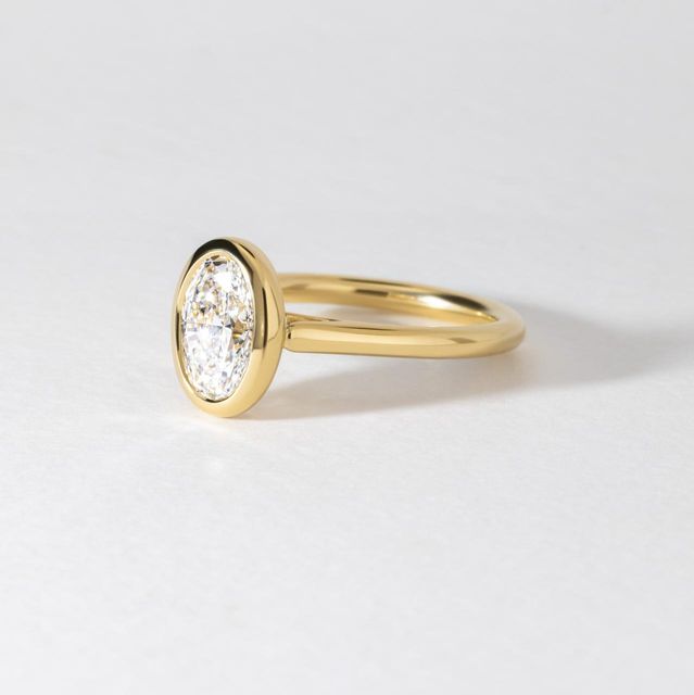1.50 Carat Lab Grown Oval Diamond Bezel Engagement Ring in Yellow Gold - Georgia