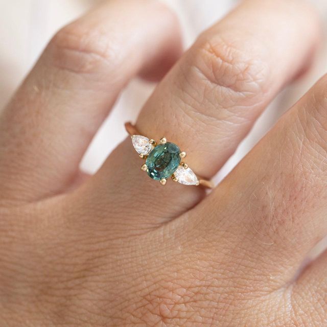1.10 Carat Natural Oval Teal Sapphire Trilogy Engagement Ring in Yellow Gold - Amaya