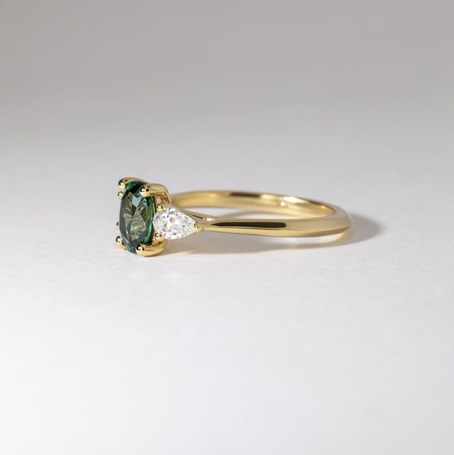 1.10 Carat Natural Oval Teal Sapphire Trilogy Engagement Ring in Yellow Gold - Amaya