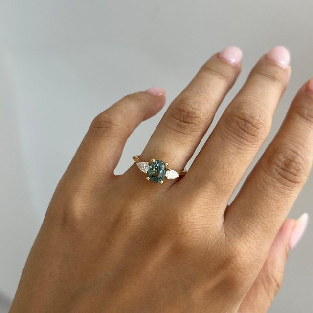 1.68 Carat Natural Oval Teal Sapphire Trilogy Engagement Ring in Yellow Gold - Amaya
