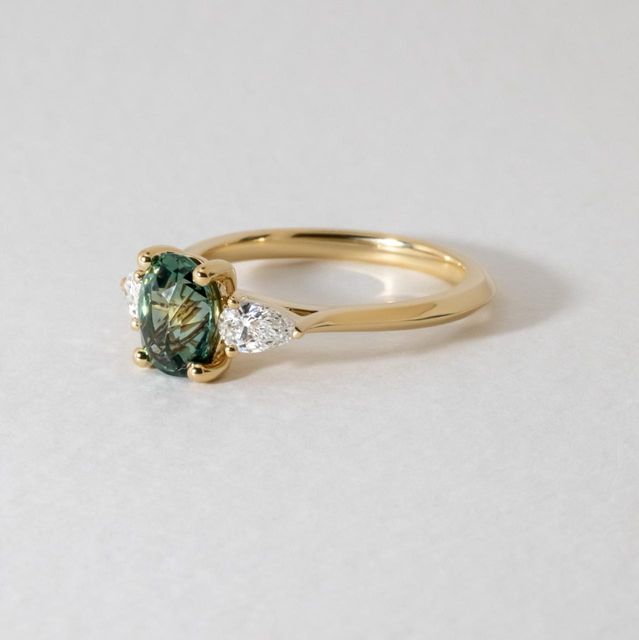 1.68 Carat Natural Oval Teal Sapphire Trilogy Engagement Ring in Yellow Gold - Amaya