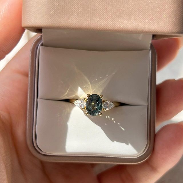 1.68 Carat Natural Oval Teal Sapphire Trilogy Engagement Ring in Yellow Gold - Amaya