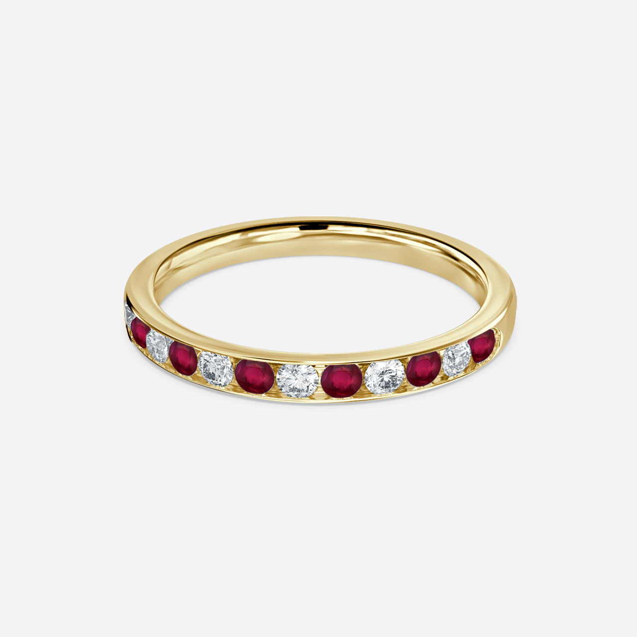 Channel Set Ruby And Diamond Ring In Yellow Gold