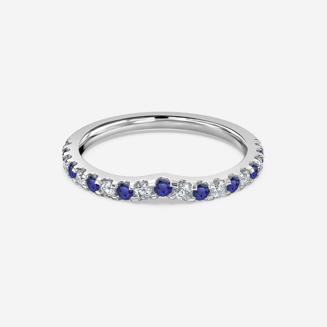 Curved White Gold Claw Set With Diamond And Blue Sapphire