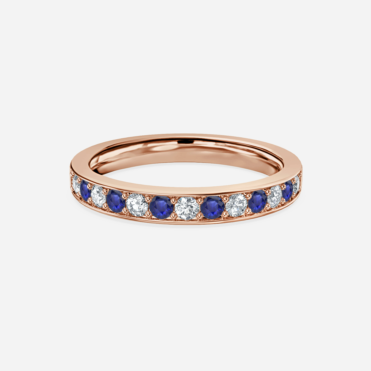Blue Sapphire And Diamond Wedding Ring Grain Set In Rose Gold