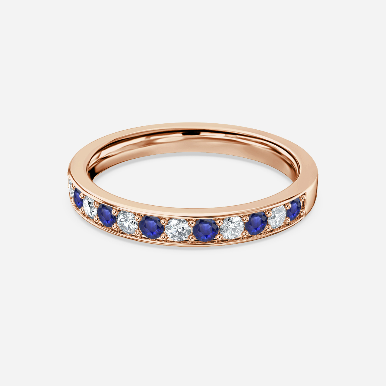 Blue Sapphire And Diamond Wedding Ring Grain Set In Rose Gold