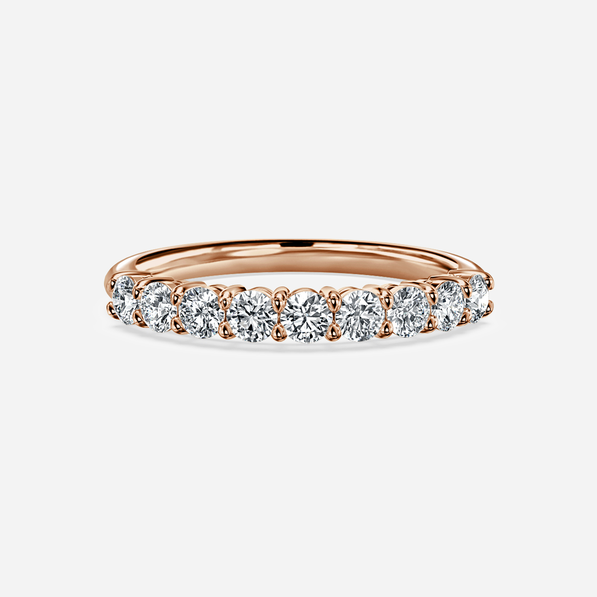 Shared Single Claw Set Half Eternity Wedding Band In Rose Gold