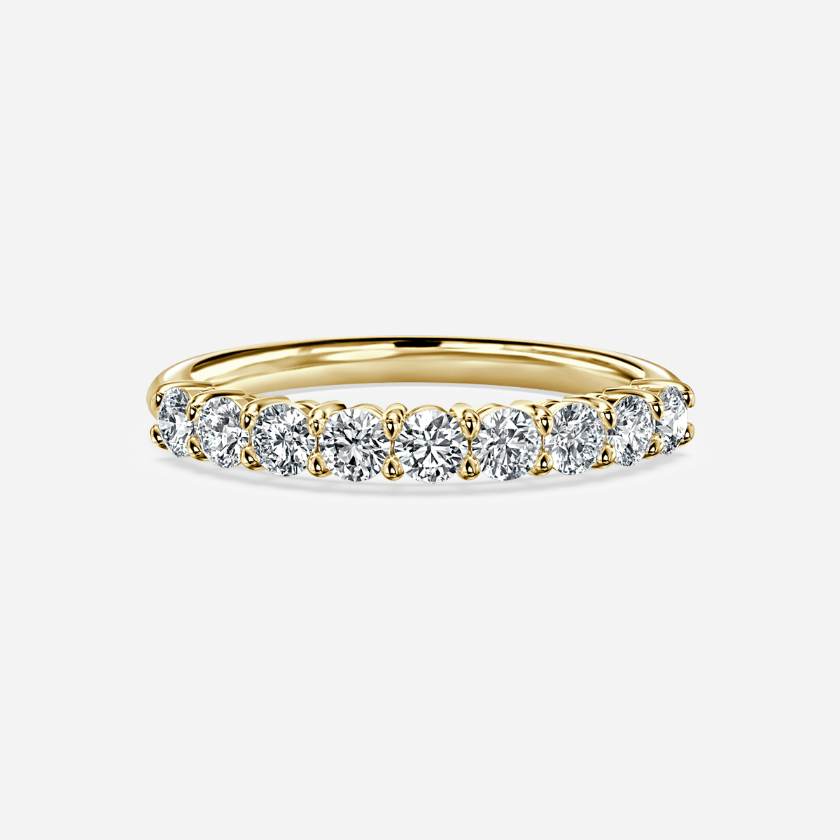 Shared Single Claw Set Half Eternity Wedding Band In Yellow Gold