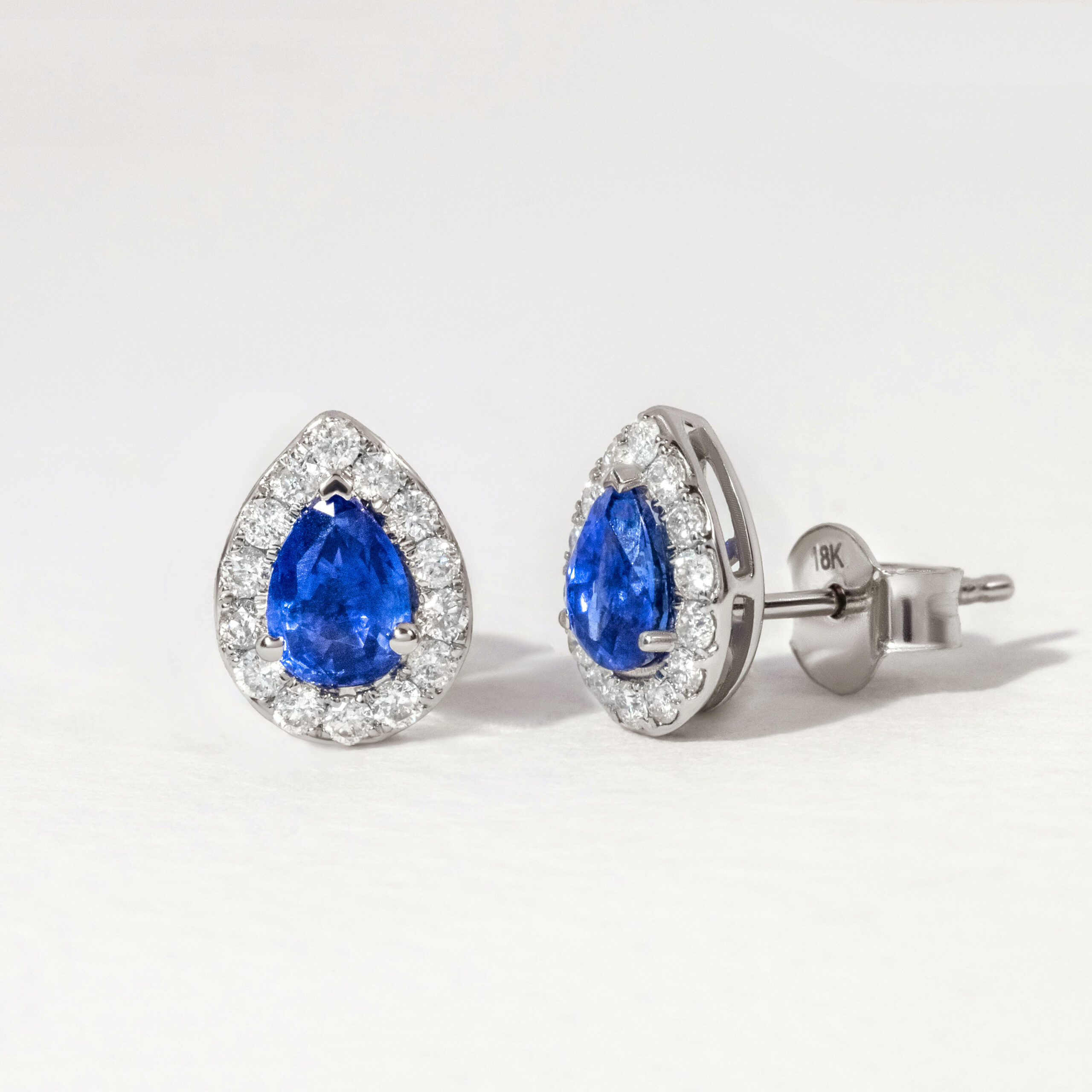 Blue Sapphire Halo Diamond Stud Earring In White Gold