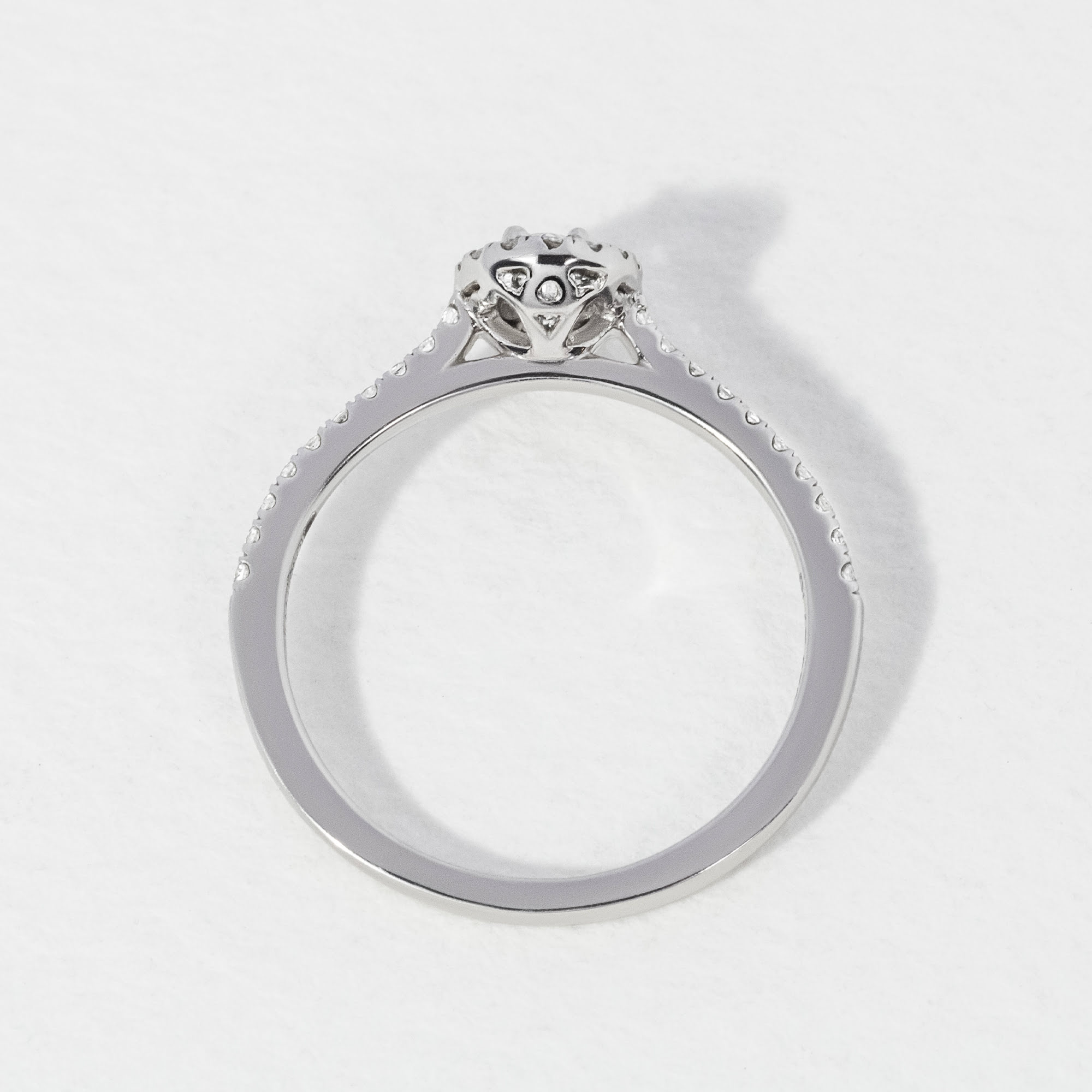 Platinum Oval 0.20ct Halo Engagement Ring