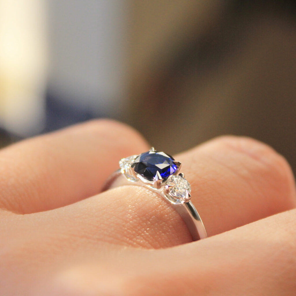 Round Blue Sapphire Trilogy Engagement Ring 0.99ct