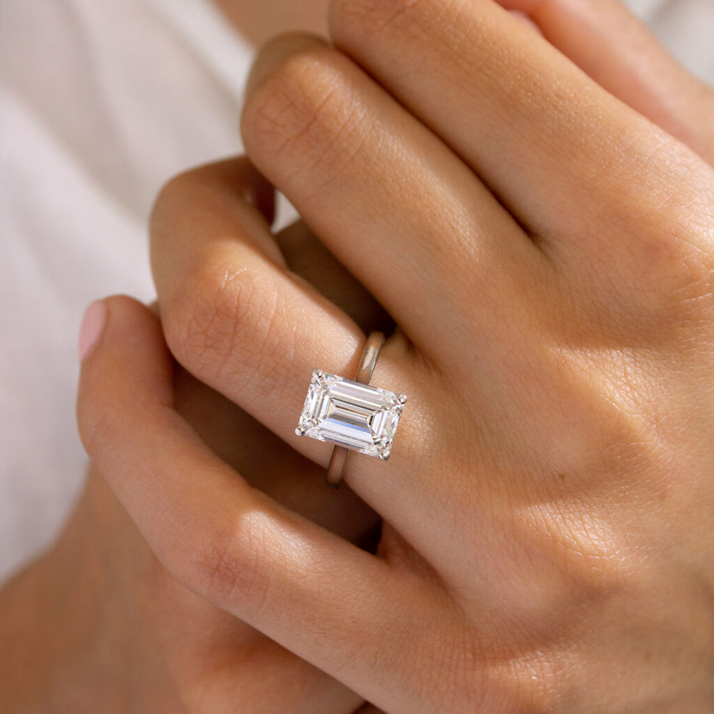 Emerald Solitaire Platinum Engagement Ring