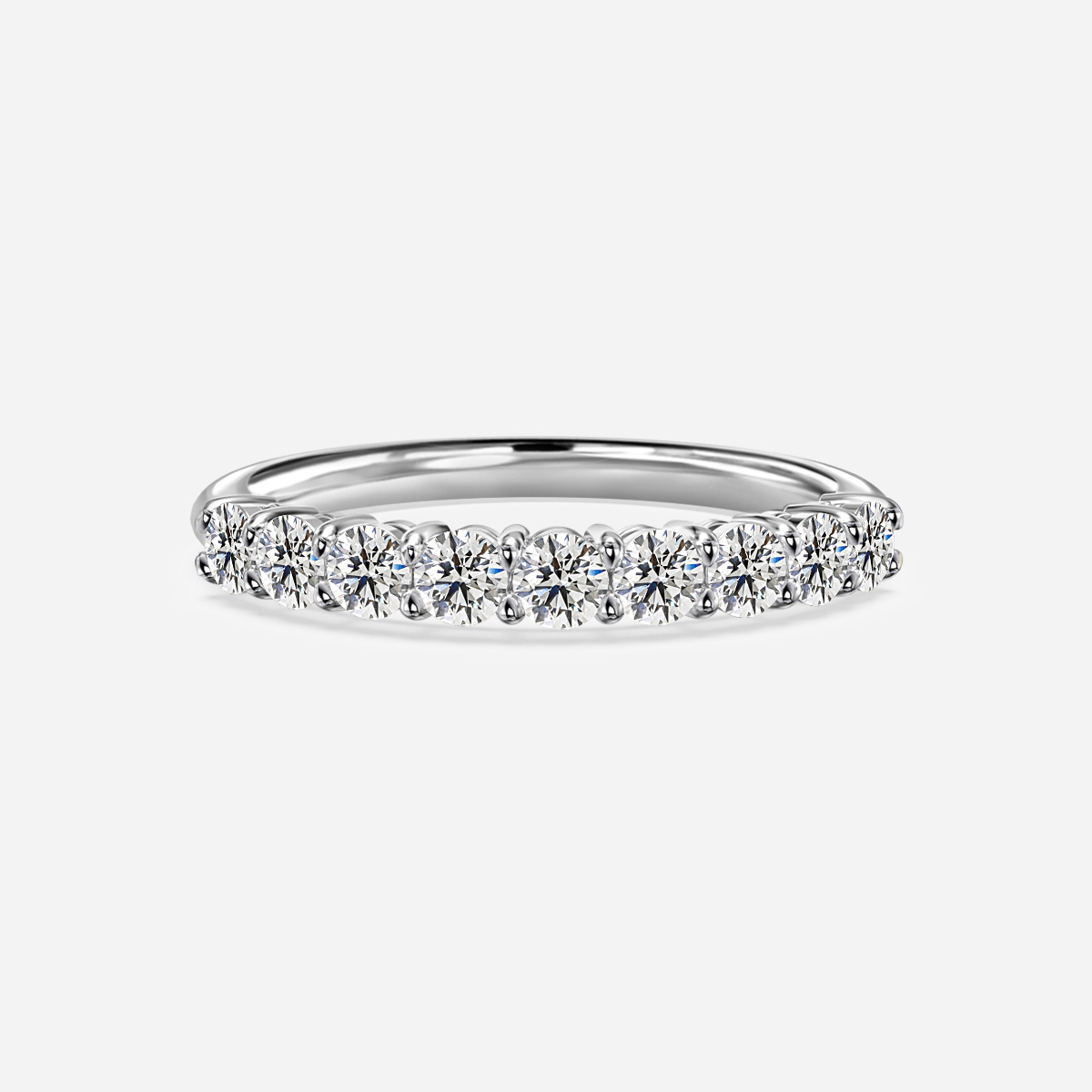 Shared Single Claw Set Half Eternity Wedding Band In White Gold