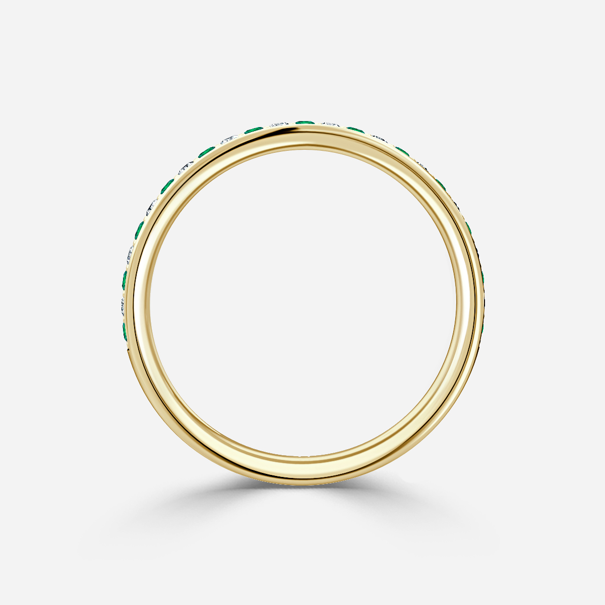 Arianna Emerald Half Eternity Wedding Ring In Yellow Gold