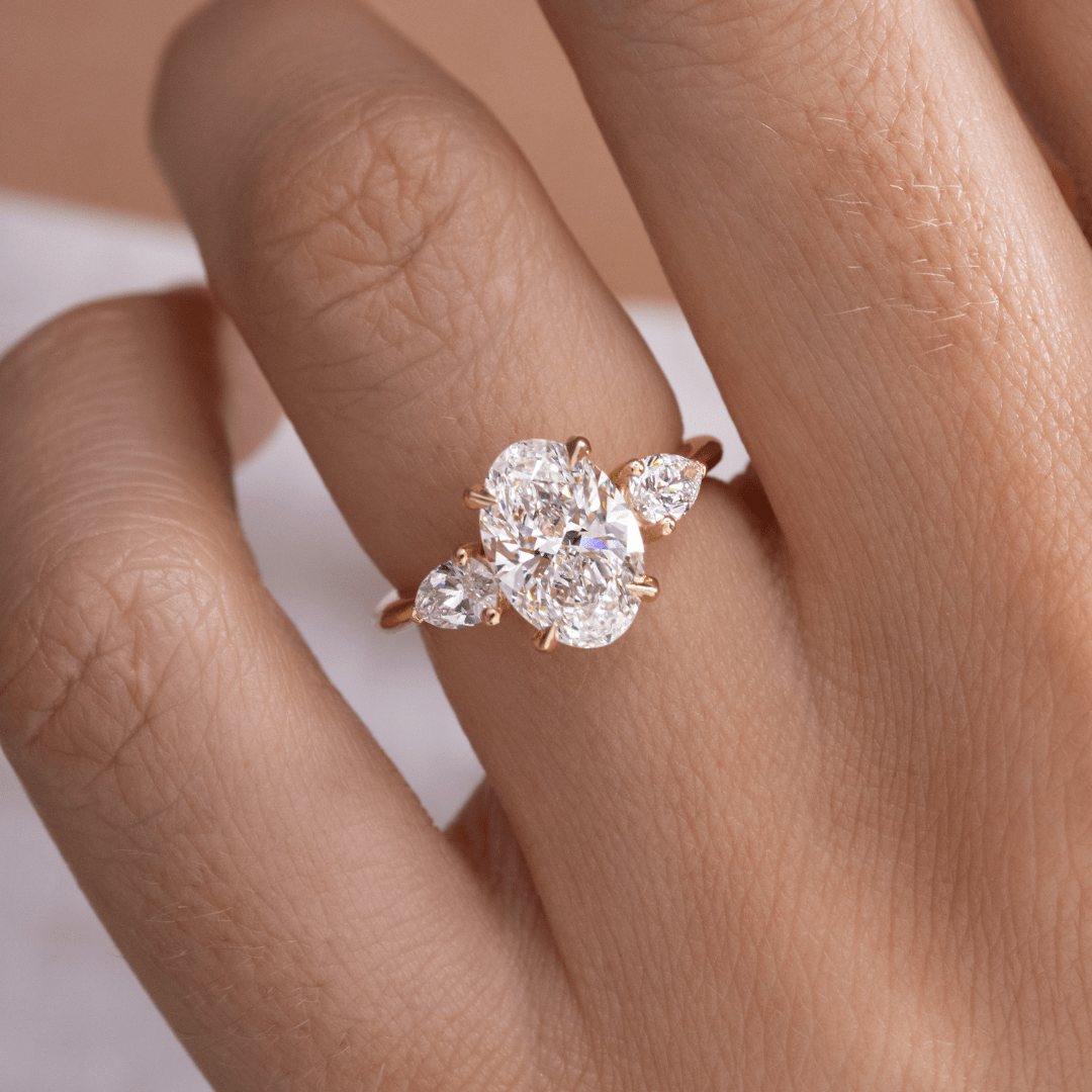 Oval and pear diamond ring discount