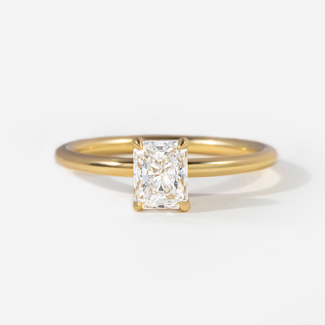 radiant solitaire ring gold