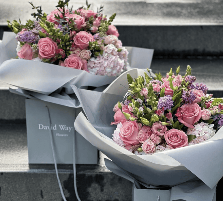 2 bouquets of diverse pink flowers